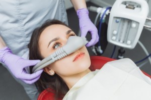 woman with nitrous oxide mask on